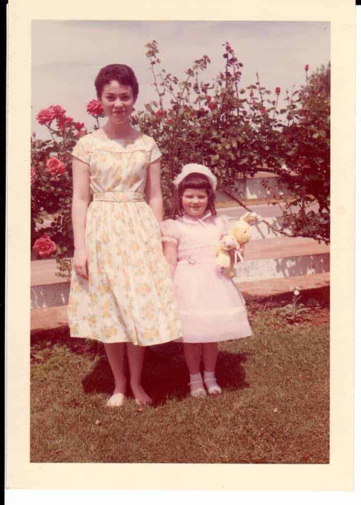 Photo - Joanne (Olivas) Ylarregui and columnist Tami Jo Nix, right, on Easter circa 1960 enjoying the sunshine in Art and Barbara Olivas’ front yard. The Olivas family lived across the street from Nix’s childhood home.