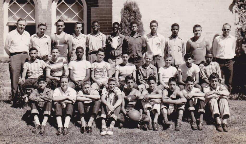 Photo - This photograph was one of many that Lincoln principal James Pyer stuck in his album. It appears to be the Lincoln School basketball team. There is no identification, however, on the reverse, the name Bill Allesseni has been penciled in.