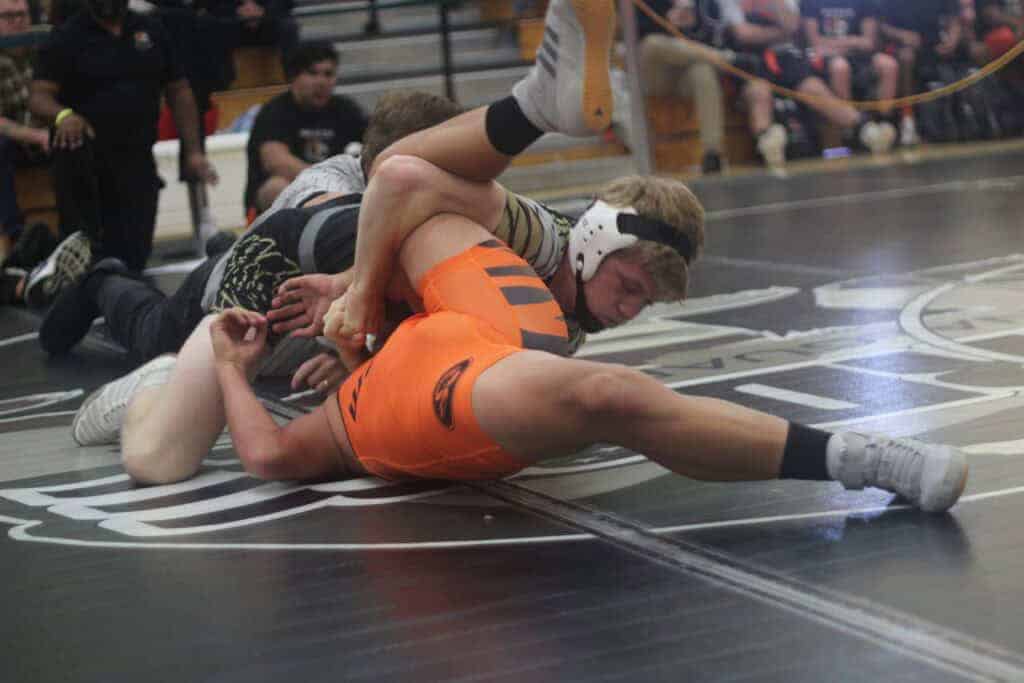 Photo - Liberty’s 138-pounder, Zack Santoro works his Wasco opponent into a pin during the Mad Ranch Duals tournament at Liberty High School. The Hawks won the Bronze Division title after winning their last three matches.