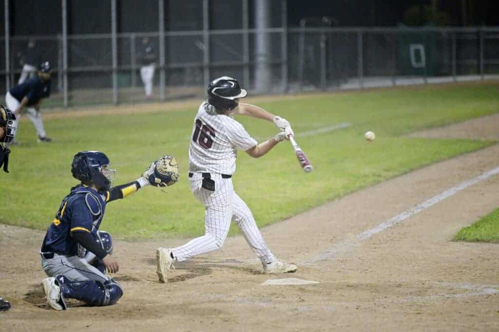 Photo - Torres’ Austin Meza rips a fourth inning, run-scoring single during Friday’s 9-2 victory over Sunnyside. 