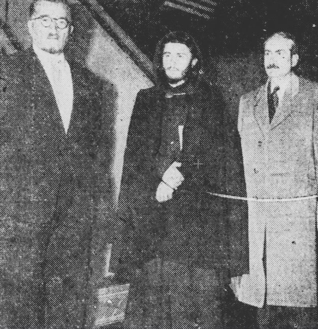 Photo - Faith Healer Avak Hagopian stands between two aides in 1947 as he prepares to meet Vaughn Arakelian, whom he hopes to cure of epilepsy.