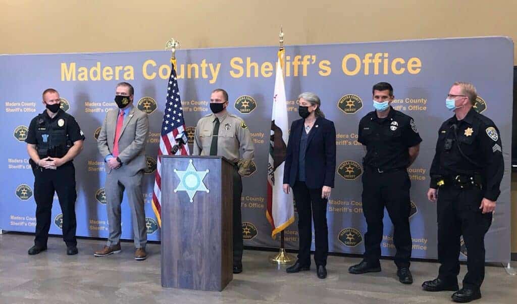 Photo - Madera County Sheriff Tyson Pogue speaks about a combined-effort drug bust that yielded 38 arrests and more than $400,000 worth of illegal drugs at a press conference Monday..