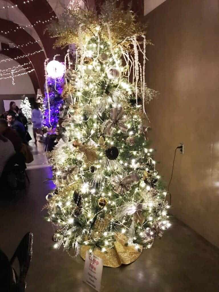 Photo - Camp Fire has participated in Trees for Charity every year since 1987. Pictured here is their glamorous decorated tree in 2022.