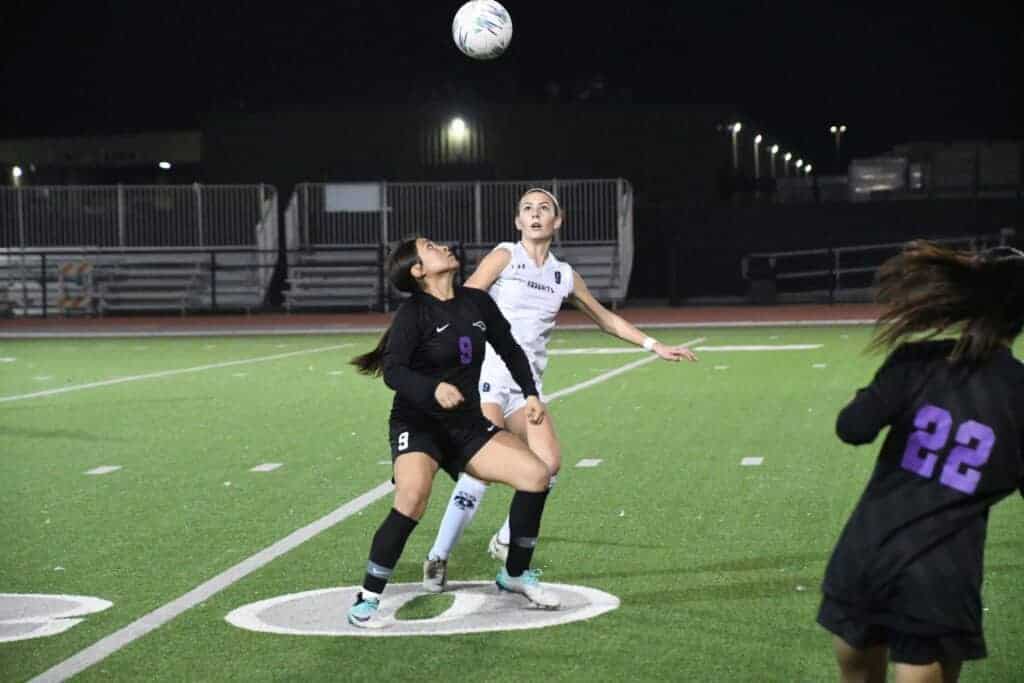 Photo - Madera South’s Lisania Diaz keeps her eye on the ball during the second half of Tuesday’s 2-1 overtime playoff victory over Yosemite. The win sent the Stallions to the Div. III quarterfinals against top seed Central Valley Christian. 
