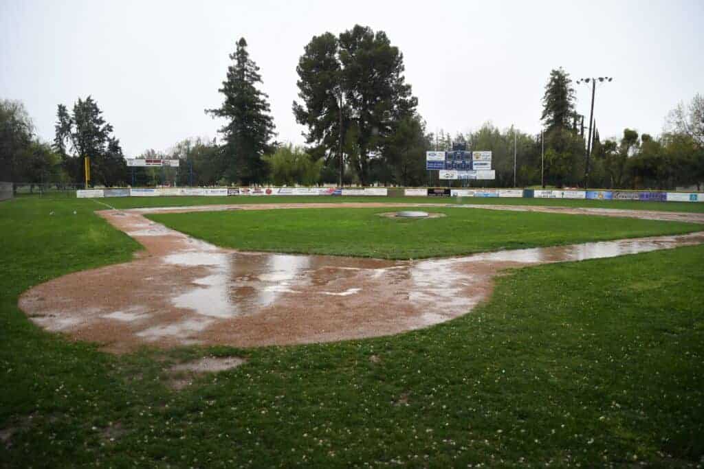 Photo - Although the fields were wet, Madera Unified School District facilities, including Eddie Chapa Field at Madera South, were already locked out due to the COVID-19 outbreak.