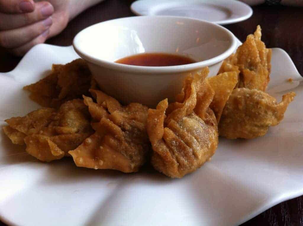 Photo - Crispy, fried wontons are a popular choice of appetizer for a holiday gathering.