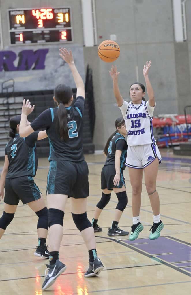 Photo of Madera South’s Jeanette Duran connects on a mid-range jumper during the third quarter of Wednesday’s loss to the Mendota Aztecs.