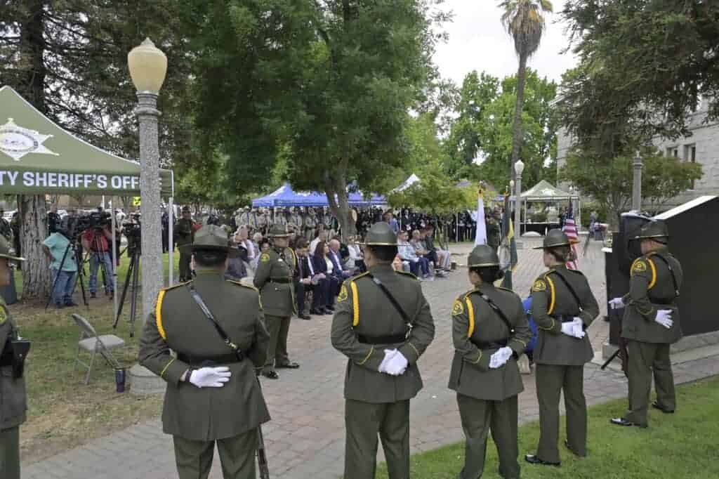 Photo - A crowd gathers during the 18th annual Madera County Law Enforcement Memorial Ceremony on Tuesday at Courthouse Park.