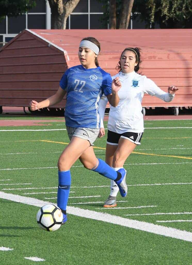 Photo - Madera’s Jazmin Piñon tries to control the ball during Tuesday’s 2-1 victory over El Capitan. She scored the eventual game-winning goal.