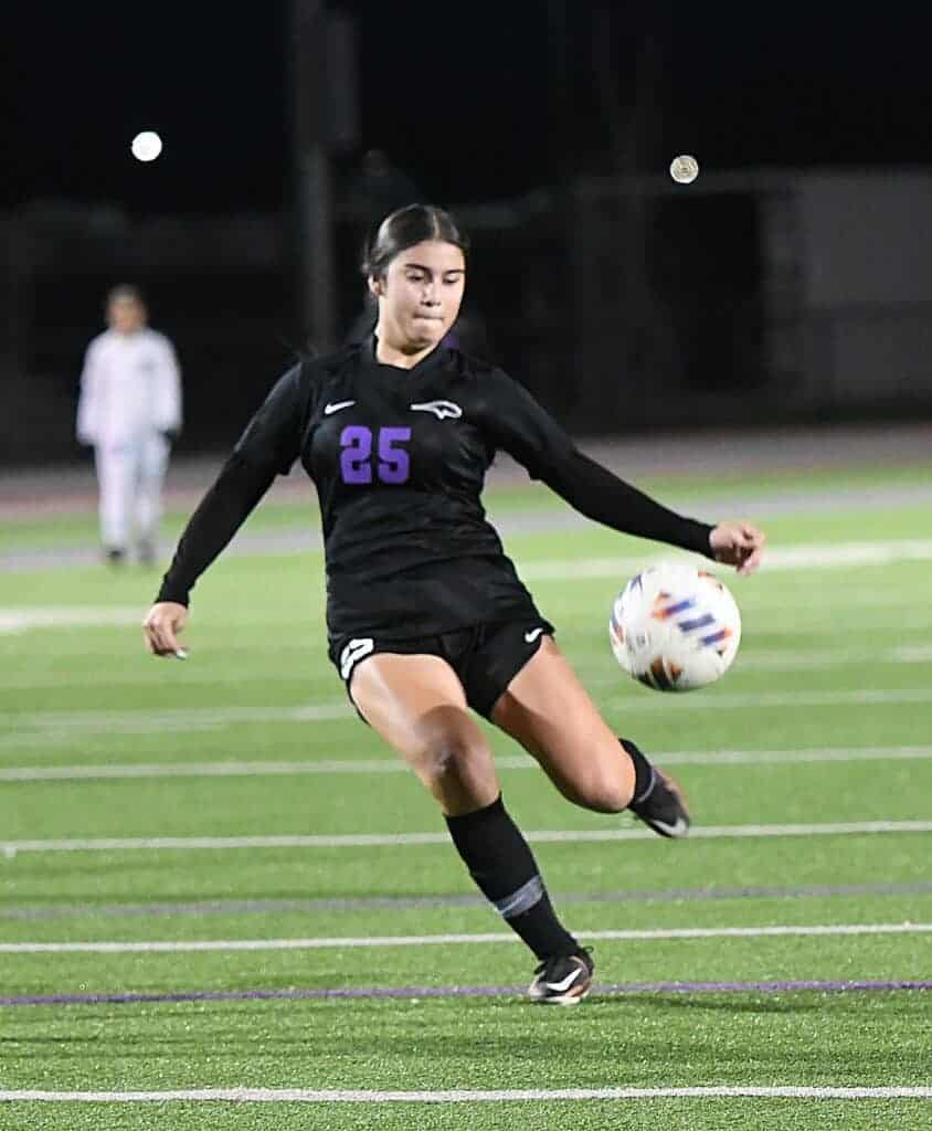 Photo - Madera South’s Alysa Gillen gets a shot off during Friday’s victory over McLane. Gillen led the Stallions with a pair of goals, including one 33 seconds into the match.