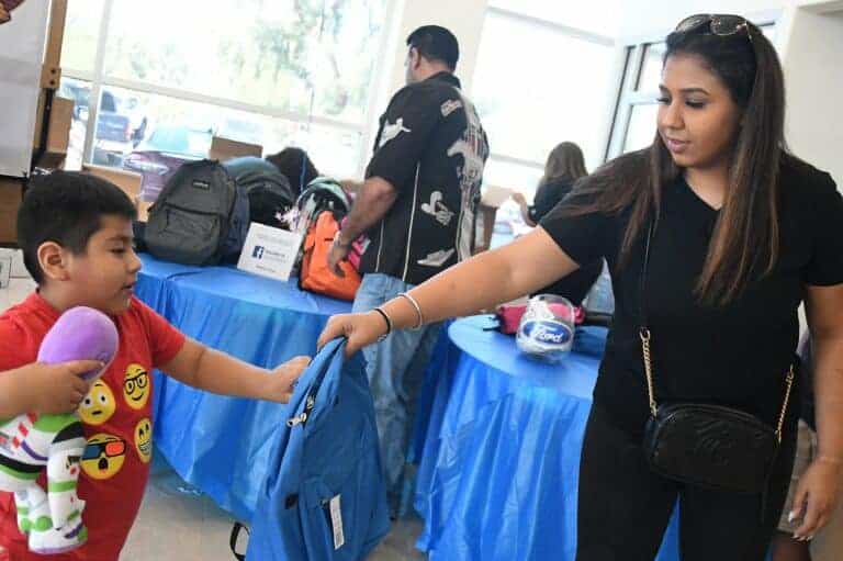 Group to host backpack giveaway