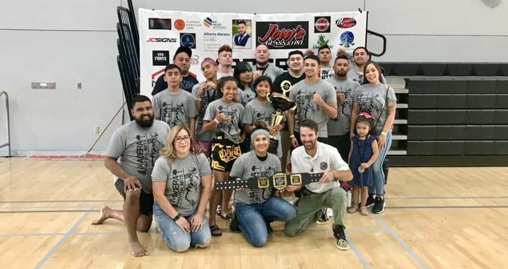 Madera Martial Arts celebrates with the team title at an IFK-PBK Tournament at Madera South on Sept. 13. The tournament featured 28 teams from throughout the state. Photo - Courtesy of Chris Arias