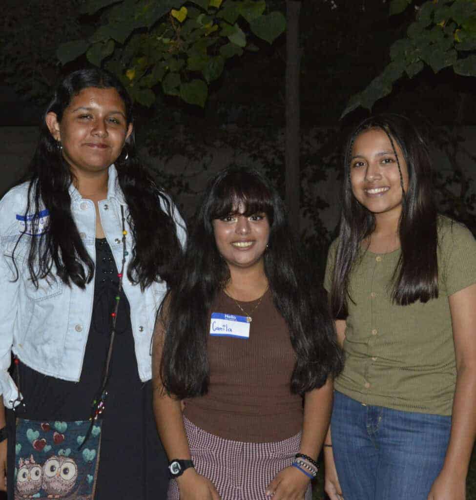 Photo - Reflecting what the AAUW camp scholarship means to them, from left, Gloria Valdivia, Camila Sosa Ramirez and Alicia Velasco shared their thoughts during a dinner on October 9.