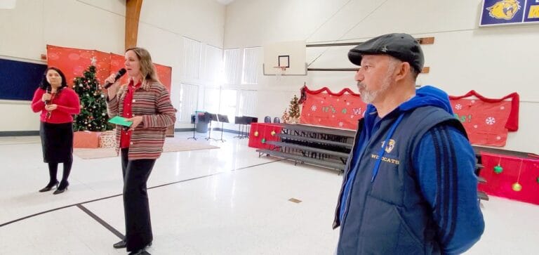 School employee saves 2 from fire
