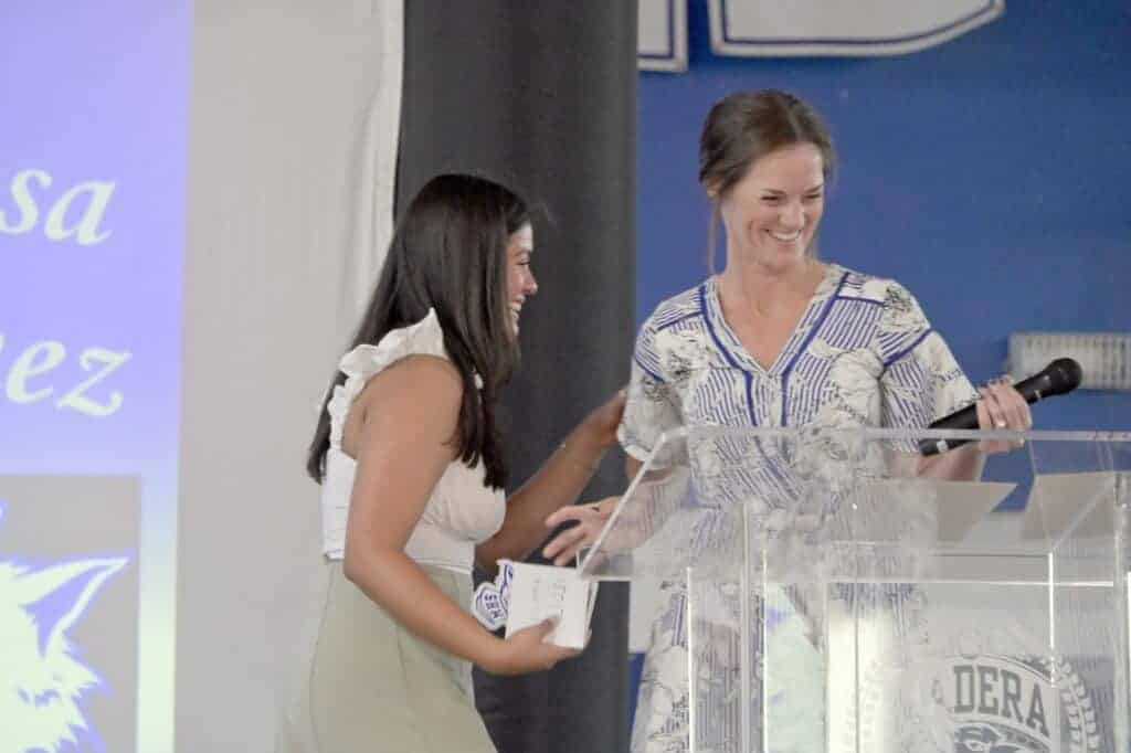 Photo - Madera girls volleyball coach Meghan Haas shares a laugh with her C.H.A.M.P.S. award recipient Alyssa Jimenez during awards night on June 3.