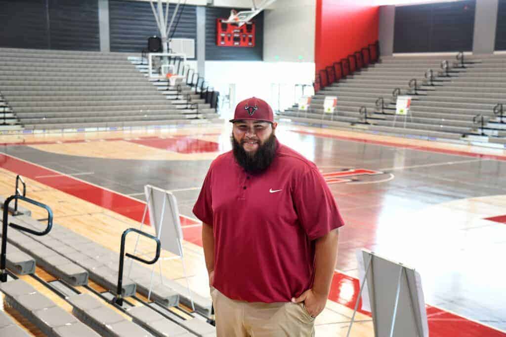Photo - Matilda Torres High School Athletics Director Jordan Murphy stands in the school’s new gymnasium. Murphy said he can’t wait for his athletes to come on campus and see the new facilities at the first-year school.