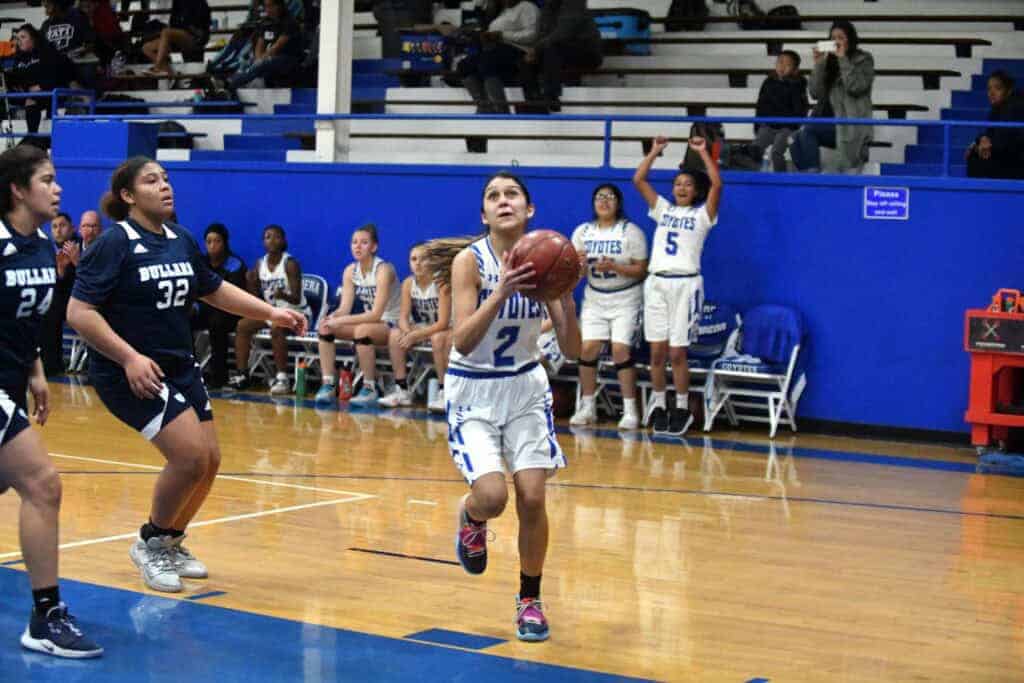 Photo - Madera’s Andrea Garcia eyes a layup during Tuesday’s victory over Bullard. She scored Madera’s first points of the game and finished with seven points.