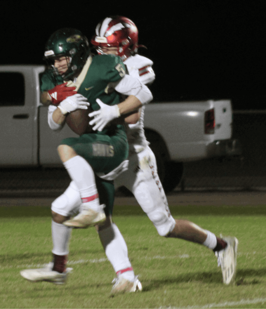 Photo - Liberty’s Brody Harlow makes the catch in front of a Chowchilla defender for Liberty’s second touchdown in Friday’s loss to the Tribe.