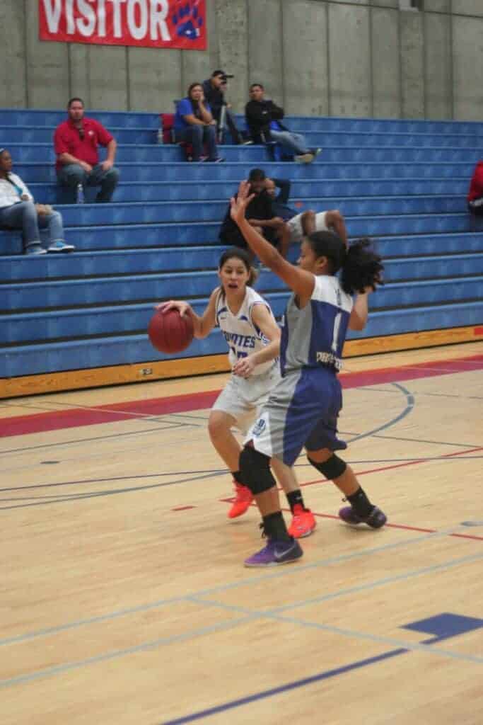 Photo - Madera’s Alexandria Campbell looks to drive to the hoop against Bakersfield during a 2014 victory. She led the Coyotes with seven points.