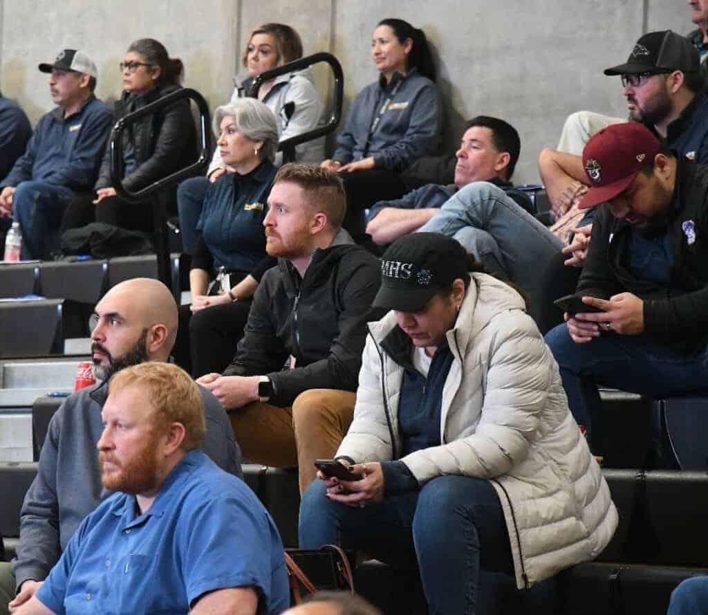 Photo - Madera South High School librarian Jordan Mattox, center, is mesmerized by the discussion at Student Champions, part two.