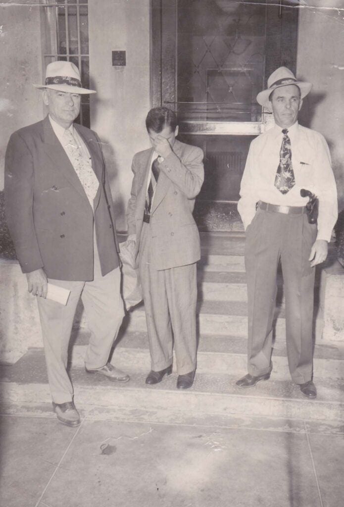 Photo - As Madera County Sheriff, Marlin Young was a busy man. Shown here on the right, he escorts a prisoner to trial. Not long after this was taken, he was investigating one of the most horrific crimes in local history: the whipping death of 4-year-old Sandra Schindler at the hands of her parents.