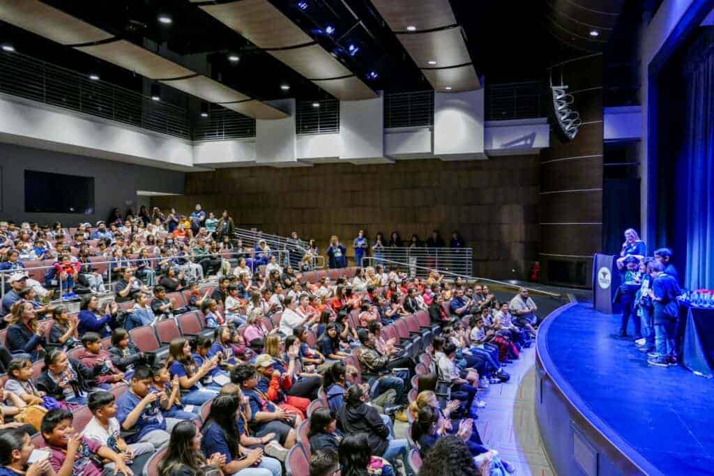 Photo - Students from 18 Madera Unified elementary schools gather at the Matilda Torres theater to hear the results from the third annual Battle of the Books competition.