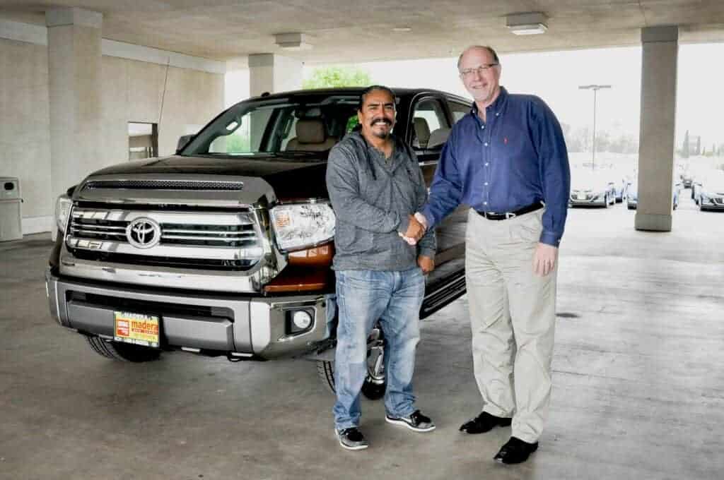 Photo - The 2017 World Ag Expo Toyota Tundra Giveaway winner receives his truck with Marty Mayfohrt, Dealer Principal and CEO of Madera Auto Center