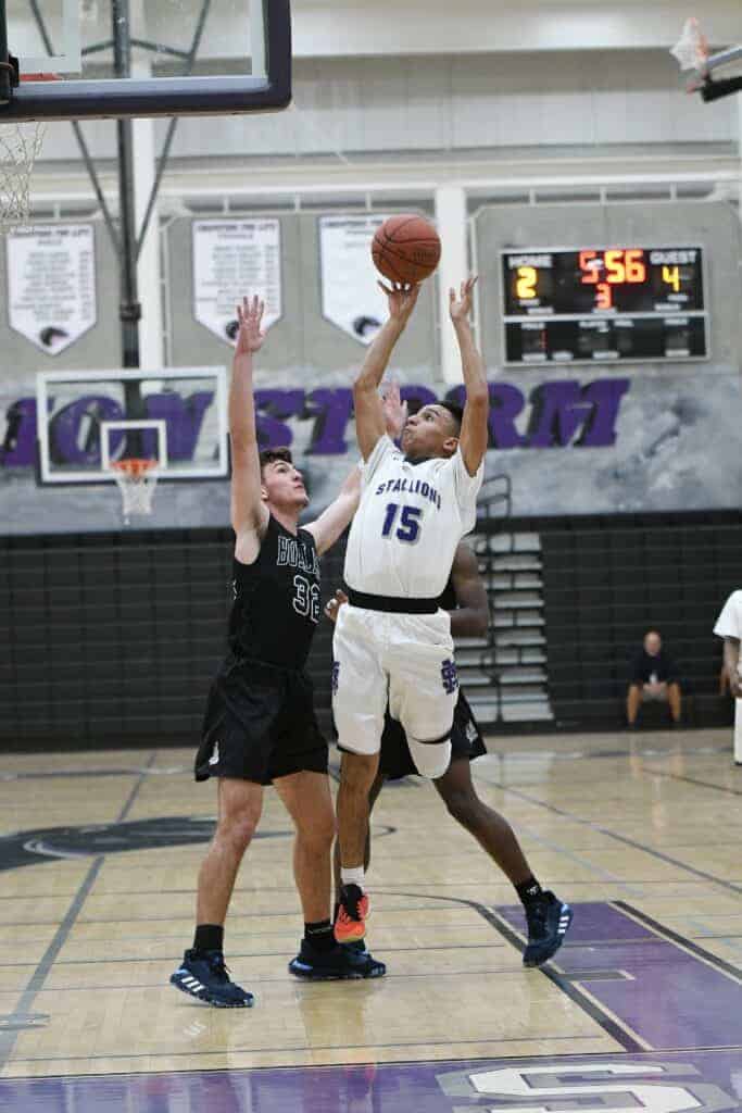 Photo - Madera South senior Isaiah Tyler gets up a shot during Thursday’s loss to Bullard on Senior Night.