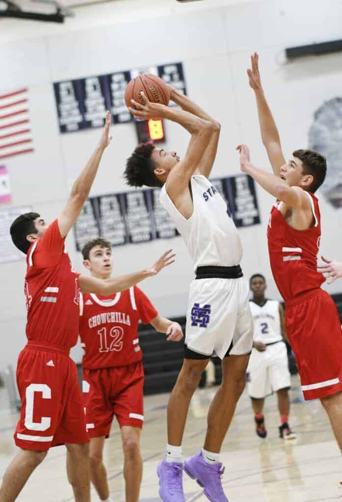 Photo - Madera South’s Jessie Ford goes up for two of his team-high 22 points in Wednesday’s victory over Chowchilla on the first day of the Madera South Classic.