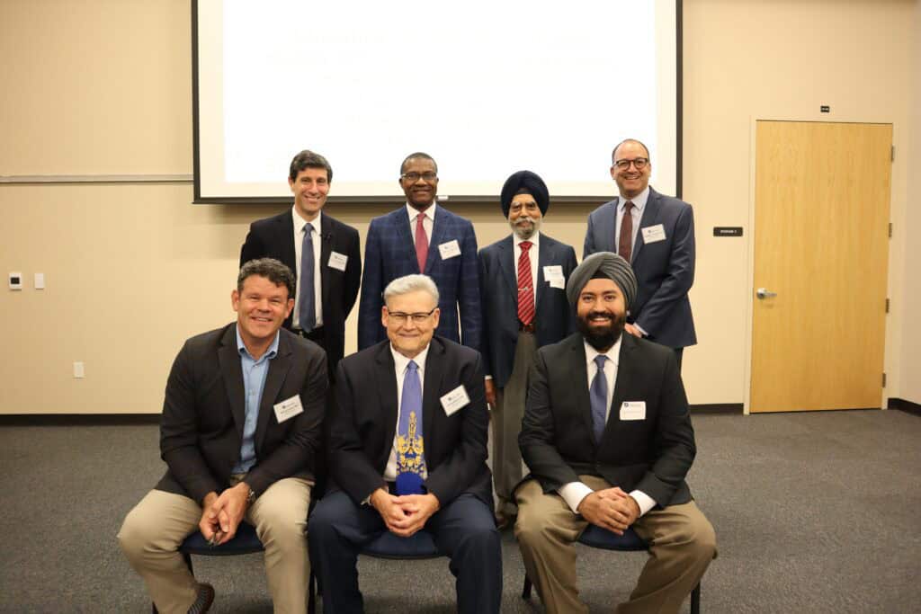 Group of diverse professionals at Madera business conference.