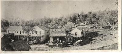 Vintage photo of historic downtown Madera with old buildings and streets.