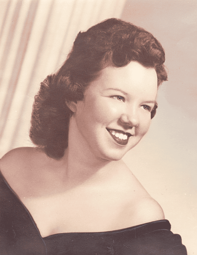 Vintage portrait of a smiling woman from the Madera Tribune archives.