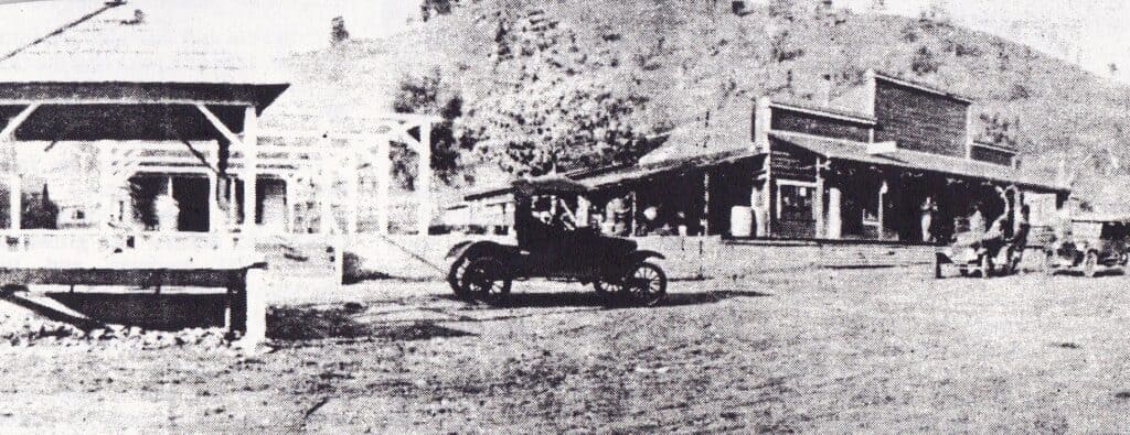 Historic downtown Madera with vintage cars and old storefronts.