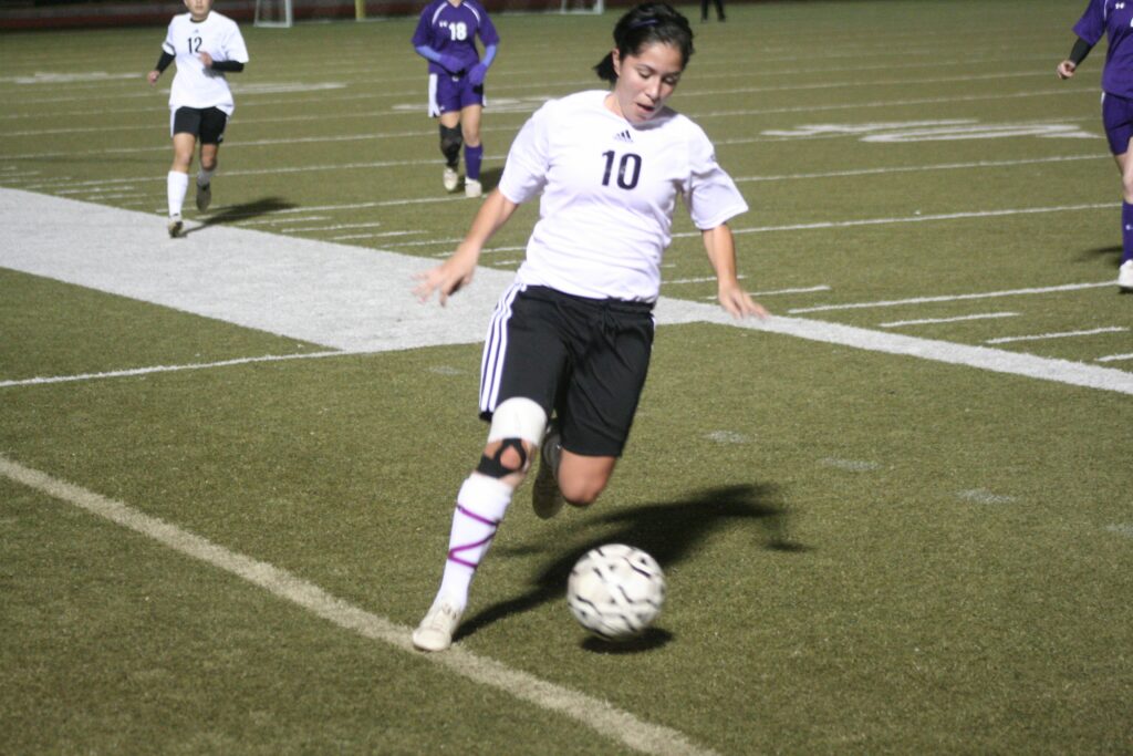 Photo - Madera South midfielder Cynthia Moreno keeps possession for the Stallions during a 2011 match.