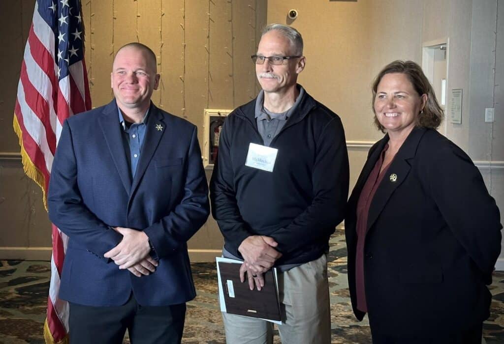 Local officials at Madera Tribune event, smiling and engaging.