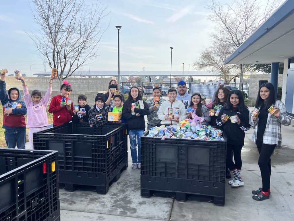 Children Collecting Recyclables for Charity.