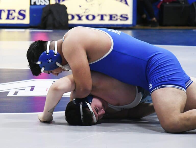 Coyotes christens mat with win