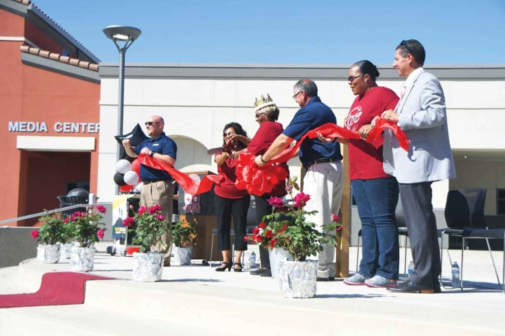 Community leaders participate in ribbon-cutting ceremony at Madera Media Center.
