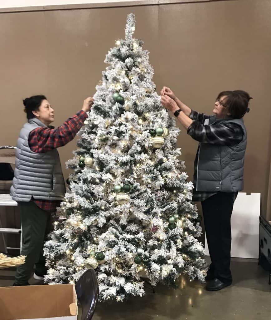 Christmas tree decorated with ornaments at The Madera Tribune office.