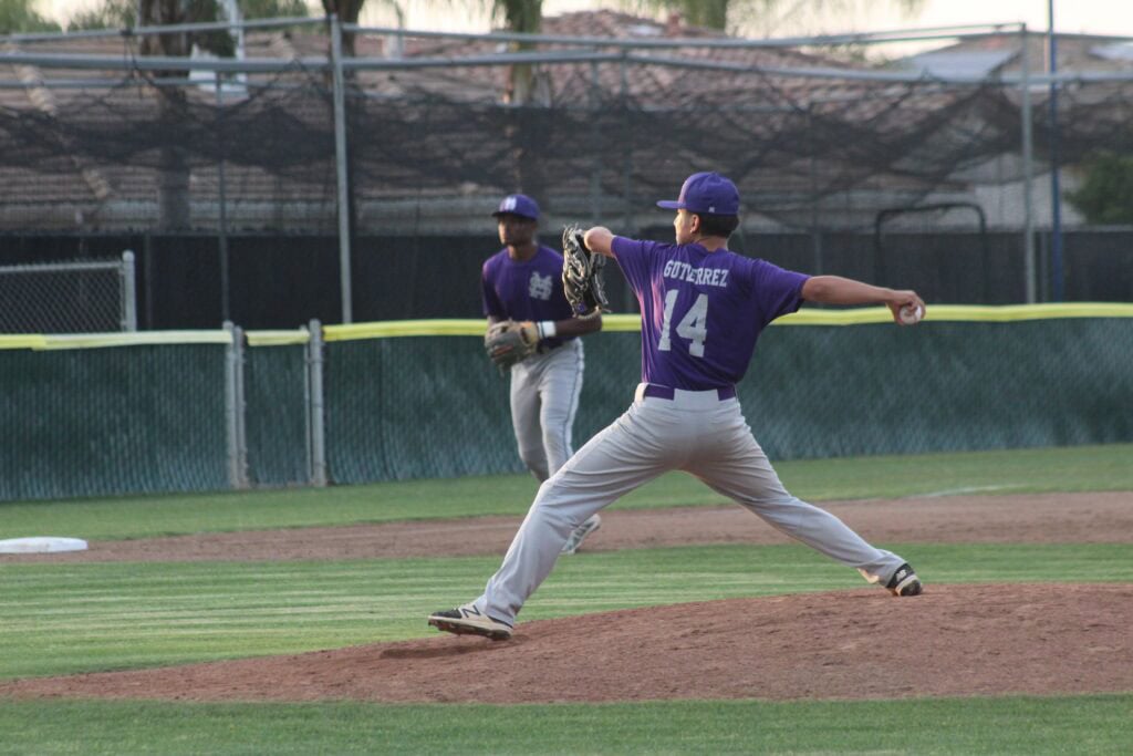 Madera baseball players in action on the field.