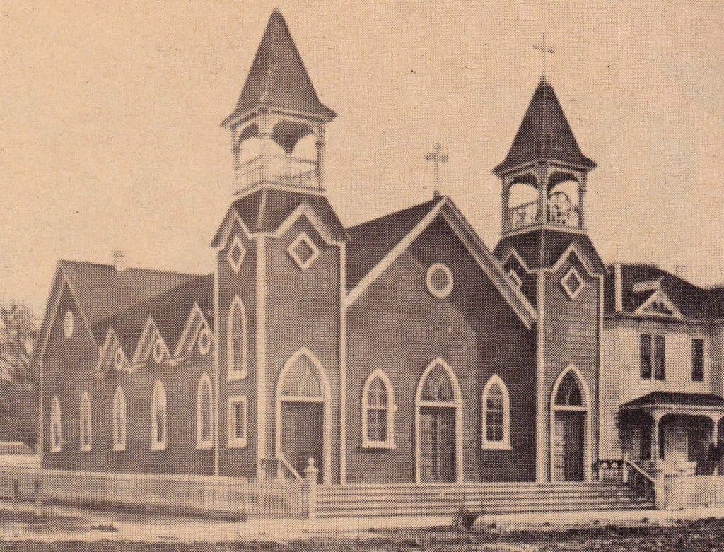 Historic Madera church building with steeples and Gothic architecture.