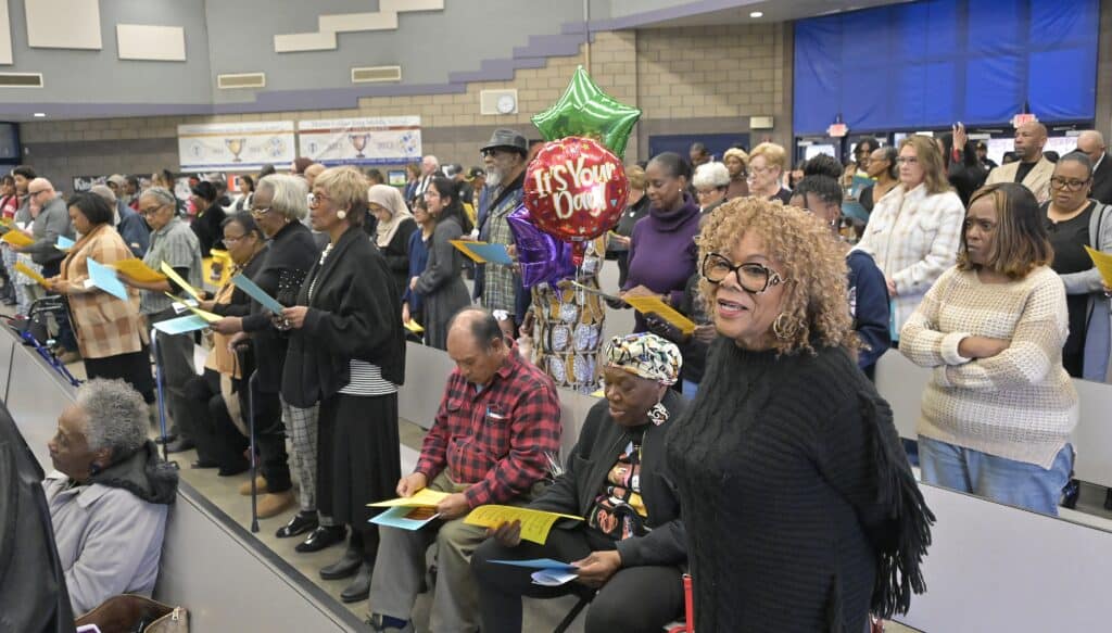 Community members gather at Madera Tribune event in the school gym.