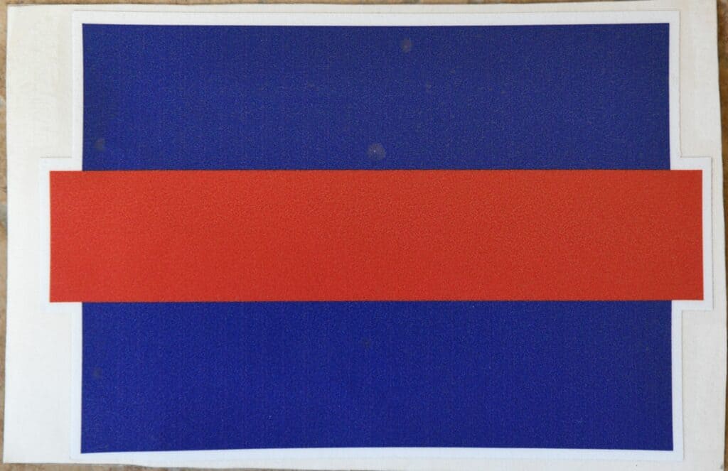 Madera Tribune logo with blue background and red stripe.