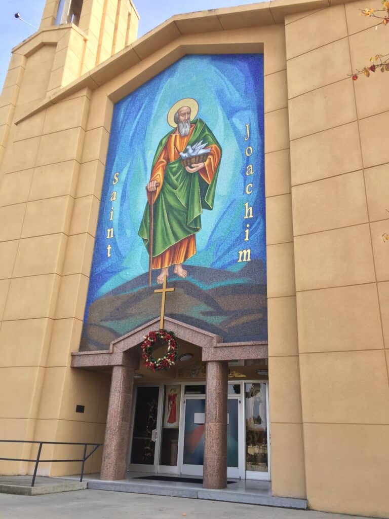 Saint Joachim religious mural on Madera Tribune building facade.