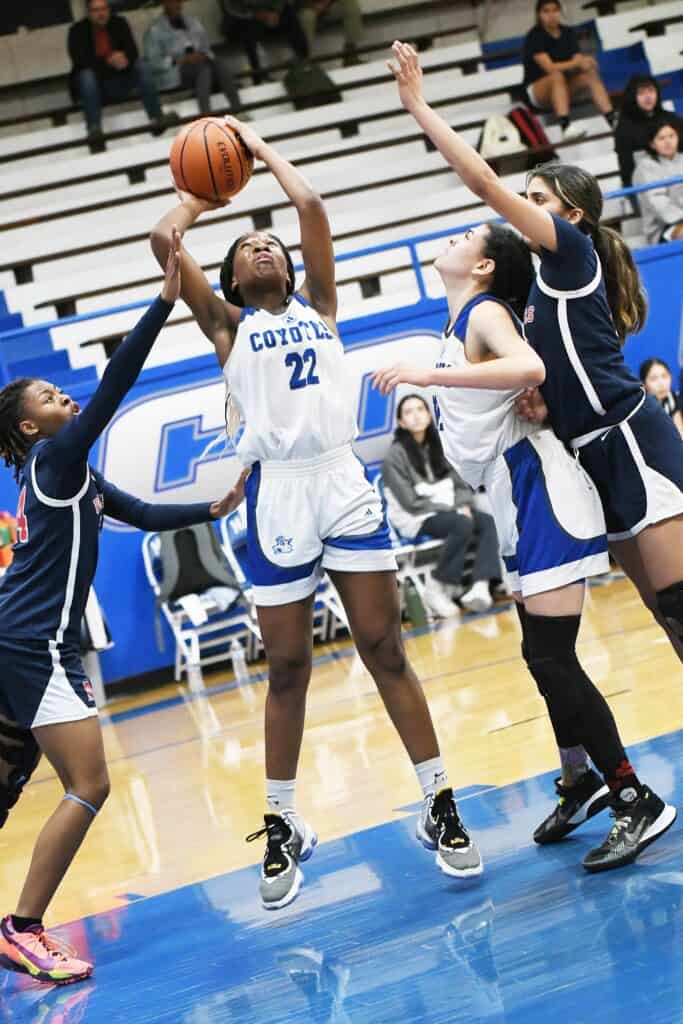 Photo - Madera’s Aaliyah String goes up for a shot during Friday’s loss to the San Joaquin Memorial Panthers. She scored a team-high nine points Friday night.