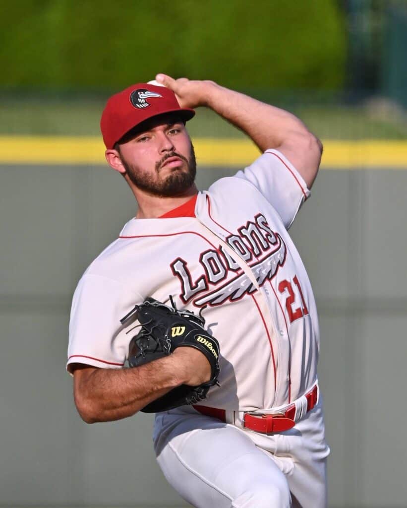 Baseball pitcher in action during a game at Madera field.