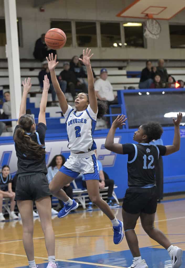Photo of Madera’s Janyah Spotwood drives the lane for a first quarter bucket in Tuesday’s loss to Clovis North. Spotwood led the team with eight points, and also led with seven points the next night in a loss to Hoover. 