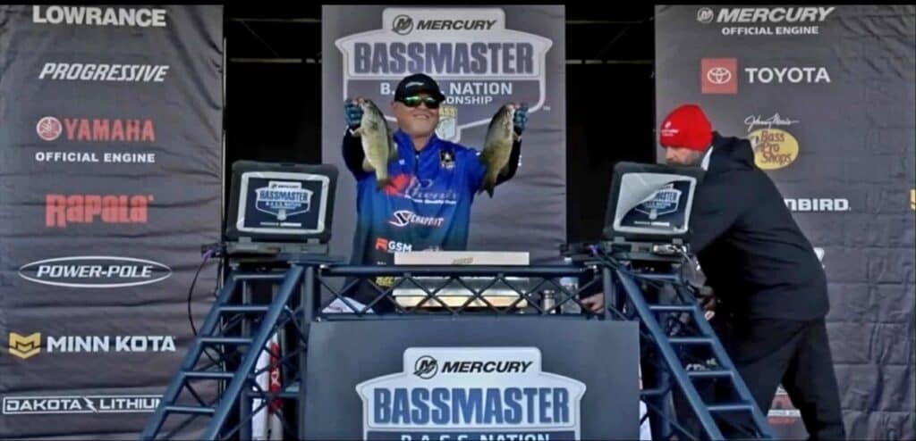 Photo of Madera angler Larry Llanes shows off part of his catch during the Bassmaster Bass Nation Championship in October.