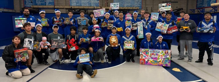 Coyotes win big on and off mat