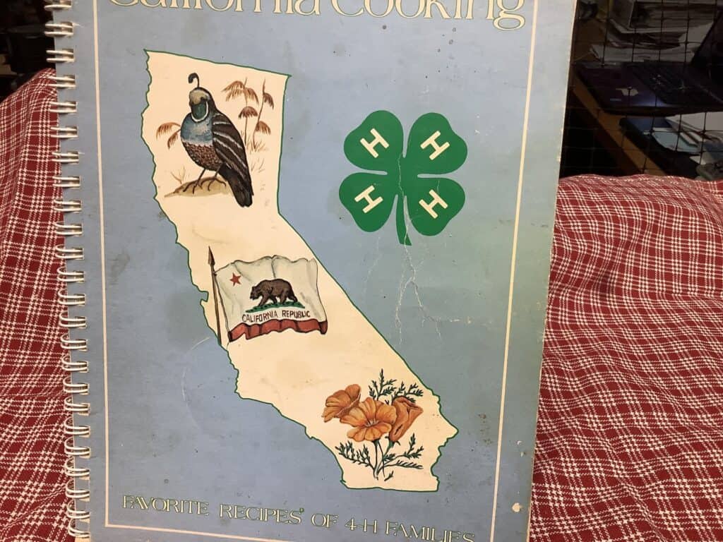 Photo - This cookbook has been used a lot during the last 36 years, as evidenced by all the smudges and creases. We were a 4-H family and enjoyed it very much.